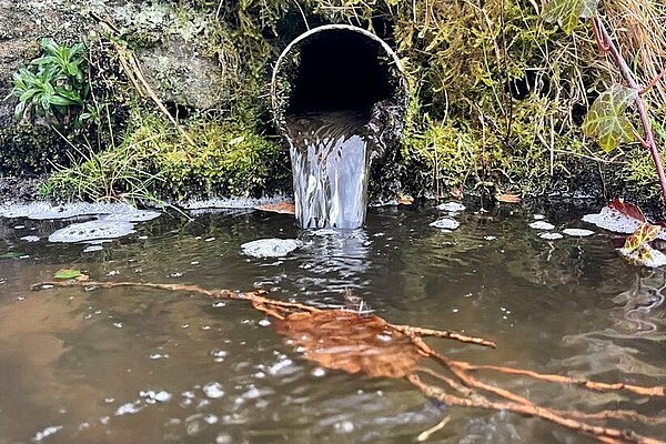 Sewage discharge into a water course